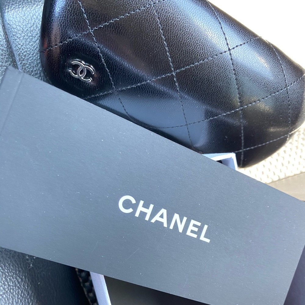 Black quilted leather Chanel sunglass case and box